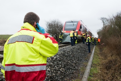 emergency service staff managing the scene of a train accident