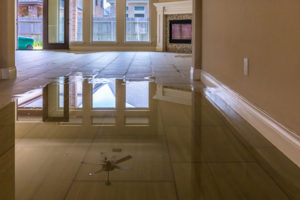 A wet floor inside of a home.
