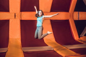 Woman jumping on a trampoline