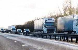 a motorway with hgvs driving along it