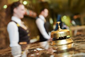 A bell on the receptionist counter of a hotel.