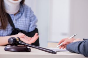 A client asks a solicitor 'What percentage do No Win No fee solicitors take?'.