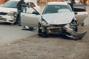 Damaged front of vehicle from a road traffic accident. 