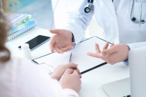 A doctor talking to a patient