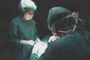 Two surgeons performing an operation.