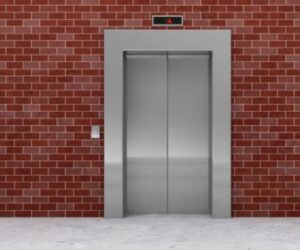A lift inside a red brick building