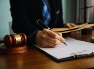A personal injury solicitor filling in a form for a trailing leads hazard claim