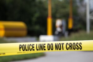 Police tape at the scene of a crime. 