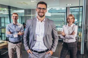 Three unnecessary surgery compensation claim solicitors standing side by side.