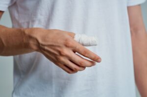 a thumb wrapped in bandages