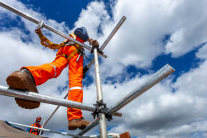 CONSTRUCTION WORKER ON SCAFFOLDING