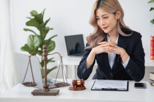 A lawyer thinks about accidental workplace data breaches whilst she sits at her desk.