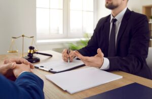 NO WIN NO FEE SOLICITOR EXPLAINING MISDIAGNOSIS COMPENSATION CLAIMS TO CLIENT