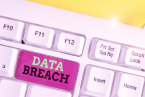 A button on a keybord says data breach.