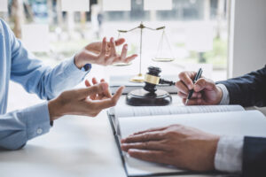 NO WIN NO FEE SOLICITOR EXPLAINING THE MEDICAL NEGLIGENCE CLAIMS PROCESS TO A CLIENT