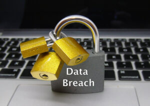 A keyword and padlock say data breach.
